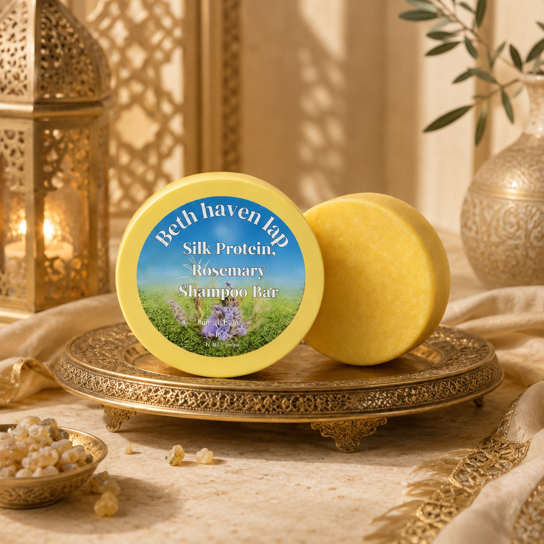 Silk Protein Rosemary shampoo bar with matching solid bar displayed on an ornate gold tray in a warm oriental spa setting.